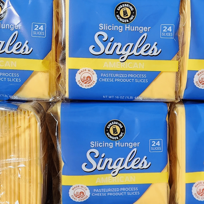 Individually Wrapped Cheese Slices 1Lb | Shelf-stable, pre-wrapped cheddar slices. Perfect for food service or donation.